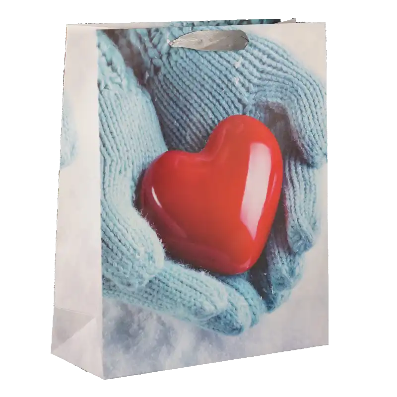 Torebka prezentowa 32x26x10 cm z nadrukiem czerwonego serca trzymanego w dłoniach w niebieskich rękawiczkach.