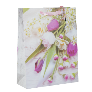 Torebka prezentowa w kwiaty 40x31x12 cm wykonana z papieru. Posiada wiosenny motyw roślinny, sznurkowe uchwyty oraz wzmocniony spód, co ułatwia pakowanie upominków dla niej na wiele okazji.