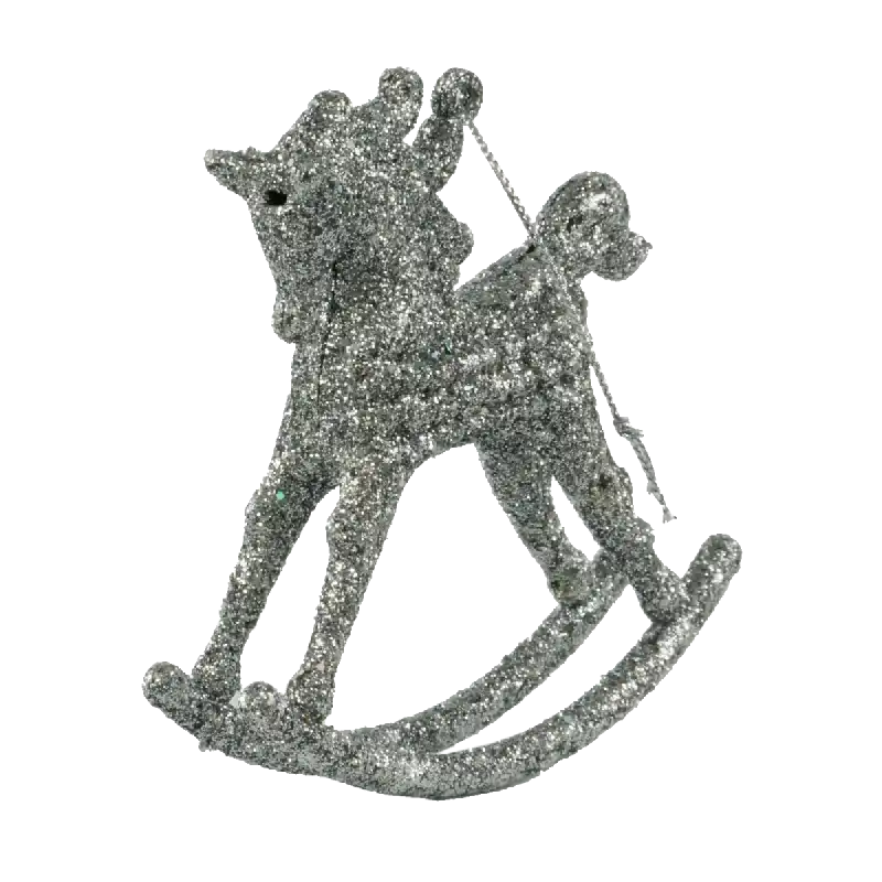Srebrny konik na biegunach w pełnym profilu. Detal dekoracyjny do zawieszki na choinkę o wymiarach 10x10 cm.