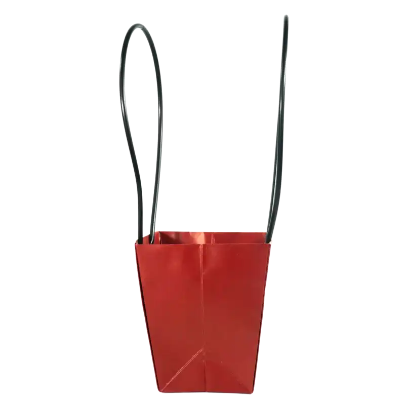 Widok na bok bordowej torebki papierowej prezentujący jej głębokość 15 cm oraz konstrukcję podstawy. Estetyczny dodatek florystyczny o wysokości 38 cm.