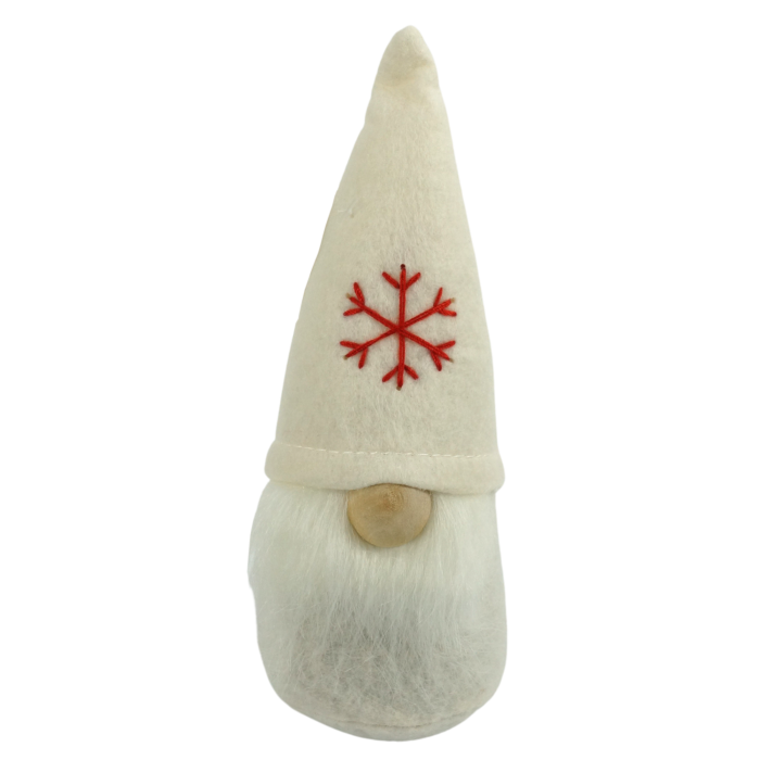 Świąteczny filcowy skrzat Adam o wysokości 16 cm. Figurka z białą brodą oraz czapeczką ozdobioną czerwonym płatkiem śniegu. Klasyczna bożonarodzeniowa dekoracja.