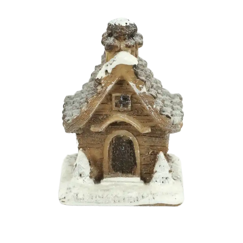 Detale miniaturowego domku z wysokim dachem i centralnie umieszczonym wejściem, pokrytego warstwą mieniącego się brokatu.