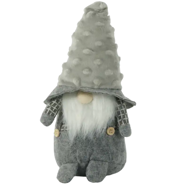 Filcowe skrzaty chłopiec 24 cm w kolorze szarym. Figurka posiada czapkę z wypukłym wzorem, miękką białą brodę oraz drewniane guziki na szelkach. Dekoracja w pozycji siedzącej.