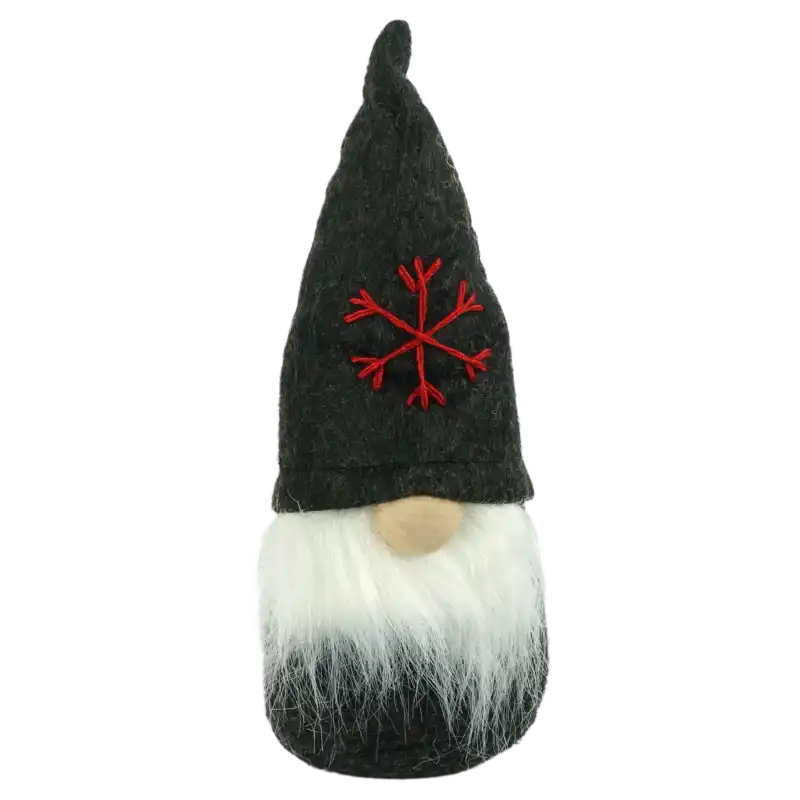 Filcowe skrzaty: świąteczna figurka chłopca o wysokości 16 cm w czarnej czapce z czerwonym płatkiem śniegu i białą brodą.