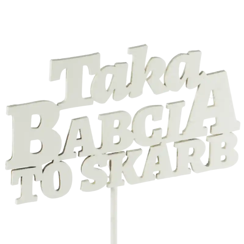 Toppery napisy na piku dla babci. Prezentacja napisu na jasnym tle, widoczny długi patyczek do wbicia w doniczkę.