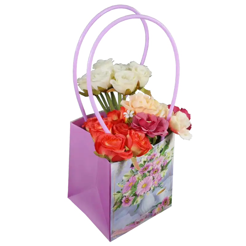 Różowa torebka na kwiaty 33 cm wypełniona kolorowymi sztucznymi kwiatami, prezentująca praktyczne zastosowanie opakowania florystycznego.