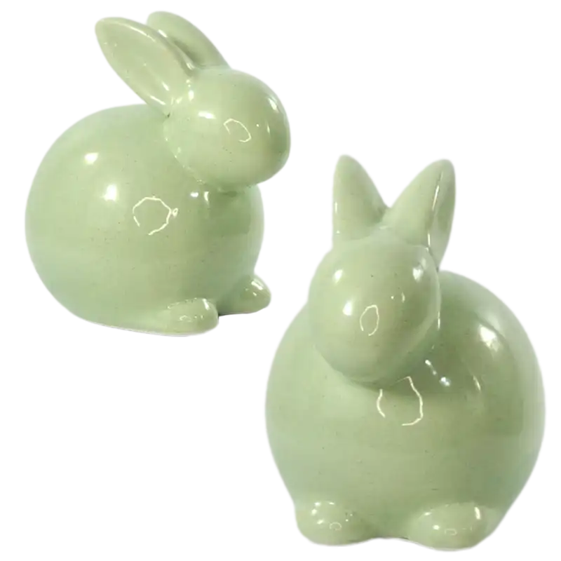 Dwa zielone zające ceramiczne o wysokości 13 cm. Nowoczesna, pastelowa dekoracja wielkanocna, która świetnie sprawdzi się jako samodzielna ozdoba lub element świątecznego stroika.