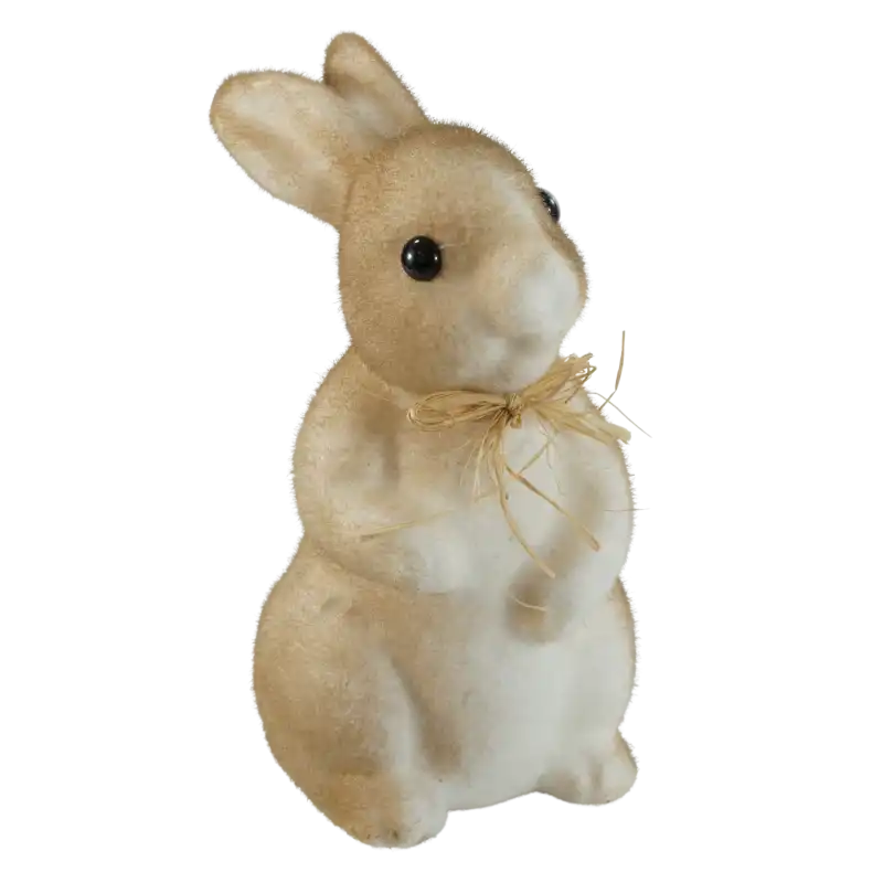 Brązowy zając flokowany 26 cm zajączki. Figurka wielkanocna z brokatem i słomkową kokardą, idealna ozdoba na regał lub komodę.