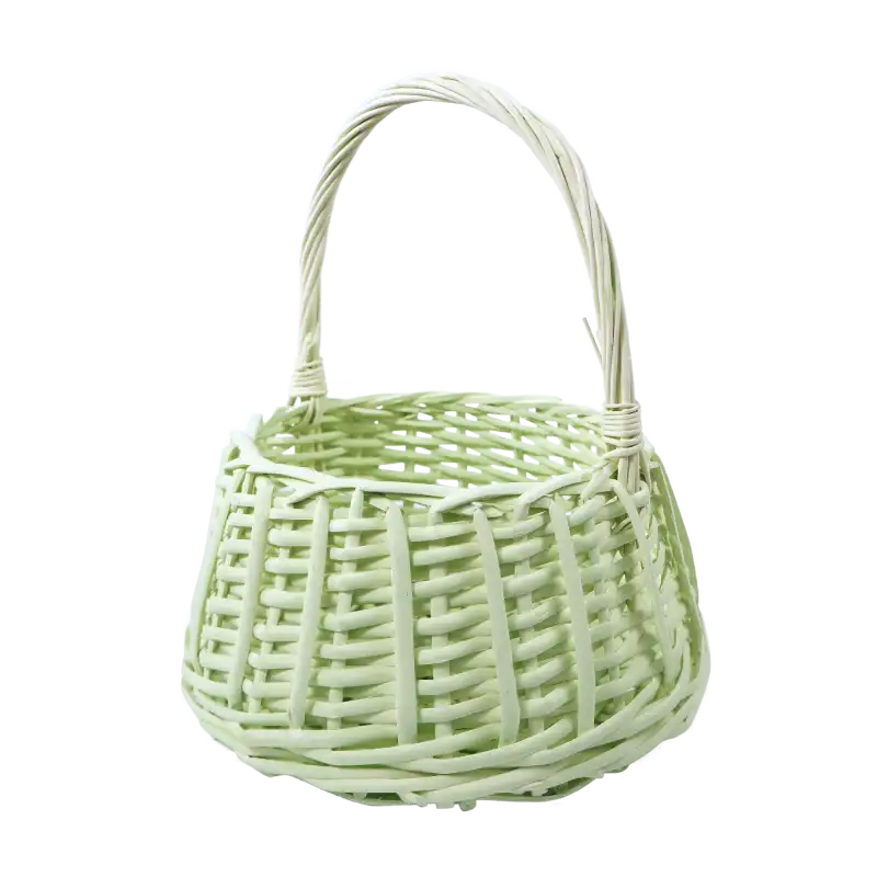 Okrągły kosz wiklinowy w pastelowym zielonym kolorze o średnicy podstawy 22 cm. Posiada zwężany ku górze kształt.