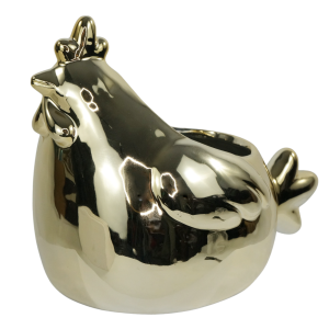 Złota kura ceramiczna o wysokości 17 cm. Nowoczesna osłonka wiosenna z lustrzanym wykończeniem, posiadająca otwór na doniczkę.
