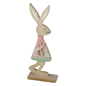 Drewniana figurka zajączka w formie dziewczynki z różowymi akcentami. Dekoracja o wysokości 24 cm idealna do wiosennych aranżacji wnętrz.