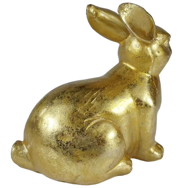 Widok na tył i bok ceramicznej figurki zajączka. Postarzane złoto podkreśla formę ozdoby wielkanocnej.