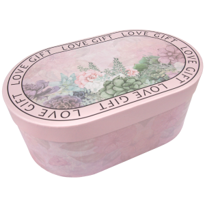 Owalny flower box z kwiatowym nadrukiem i napisem Love Gift. Pudełko o wymiarach 32x20x12 cm, idealne na podziękowanie dla rodziców lub jako elegancka dekoracja domu.