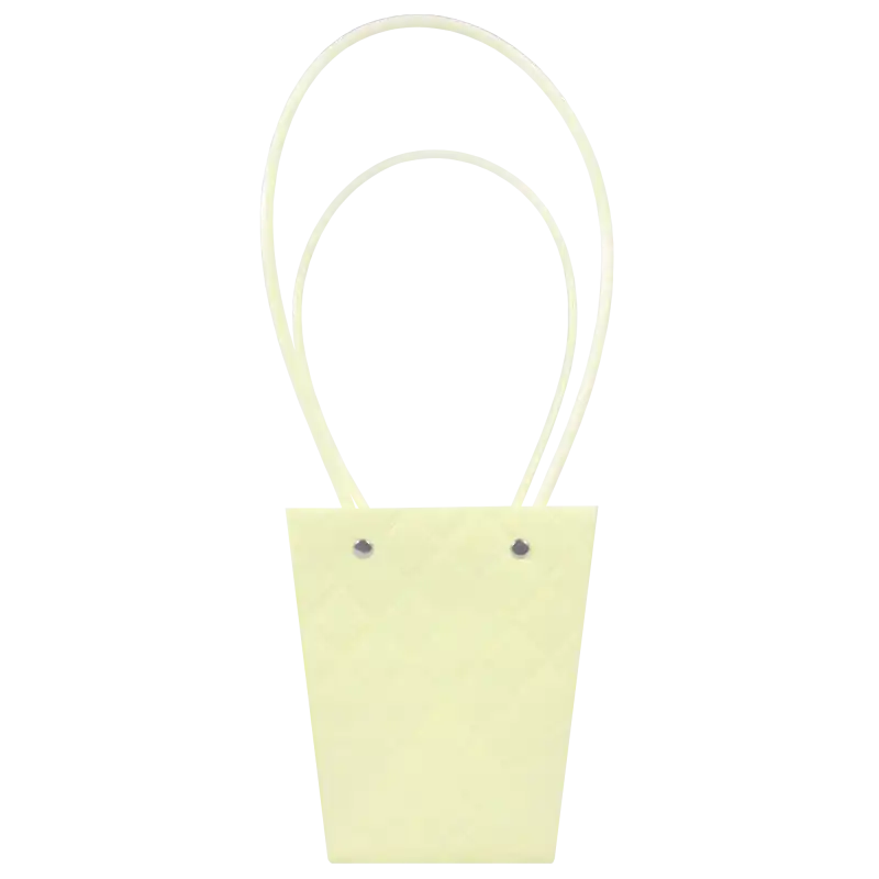 Żółta pikowana torebka na kwiaty 36 cm z wyraźnym wzorem w romby i dwoma uchwytami. Estetyczna oprawa prezentowa o podstawie 8x8 cm.