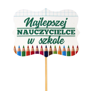 Zbliżenie na papierowy topper Najlepszej nauczycielce w szkole o długości 28 cm. Dekoracja posiada kolorowy nadruk z motywem kredek, idealnie nadaje się do personalizacji prezentów dla nauczyciela.