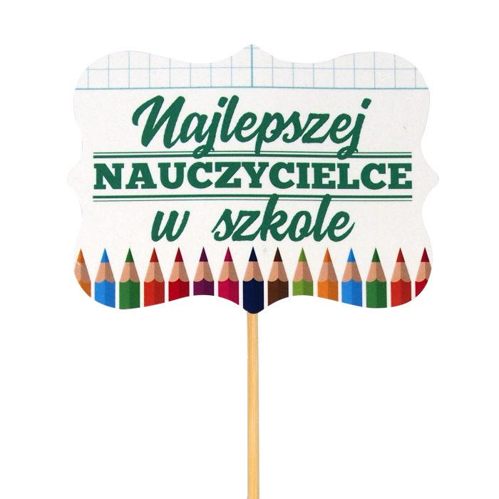 Zbliżenie na papierowy topper Najlepszej nauczycielce w szkole o długości 28 cm. Dekoracja posiada kolorowy nadruk z motywem kredek, idealnie nadaje się do personalizacji prezentów dla nauczyciela.