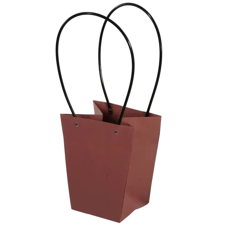 Pudrowa różowa torebka kwiatowa o wysokości 42 cm z czarnymi uchwytami. Wykonana ze wzmacnianego papieru z ochronną warstwą wewnętrzną, idealna na flower boxy.