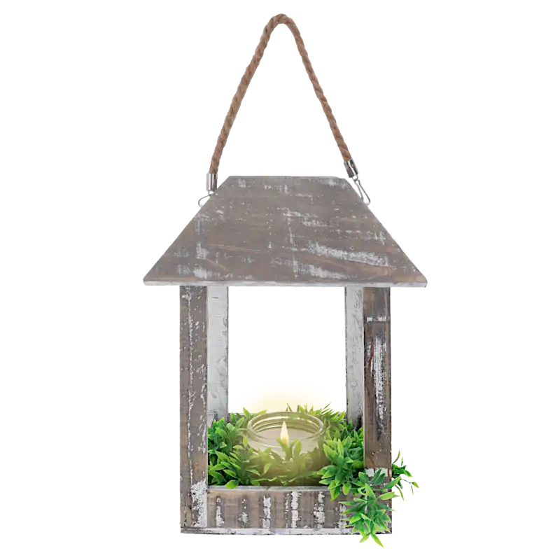 Drewniany lampion w stylu vintage z umieszczonym wewnątrz szklanym świecznikiem oraz dekoracyjną zielenią na podstawie.