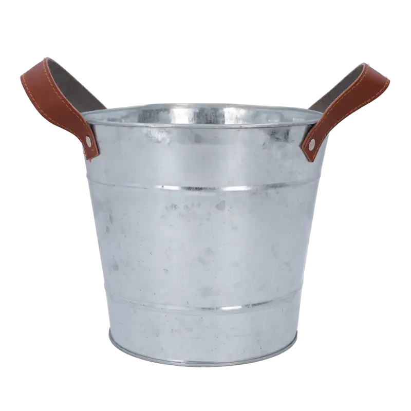 Pusta metalowa osłonka o średnicy górnej 18 cm z charakterystycznymi brązowymi uchwytami z ekoskóry.