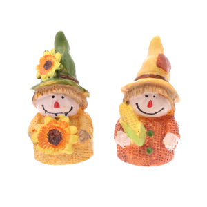 Zestaw dwóch samoprzylepnych figurek strachów na wróble o wysokości 6 cm. Ozdoby jesienne z polyresinu z motywem słonecznika i kukurydzy.