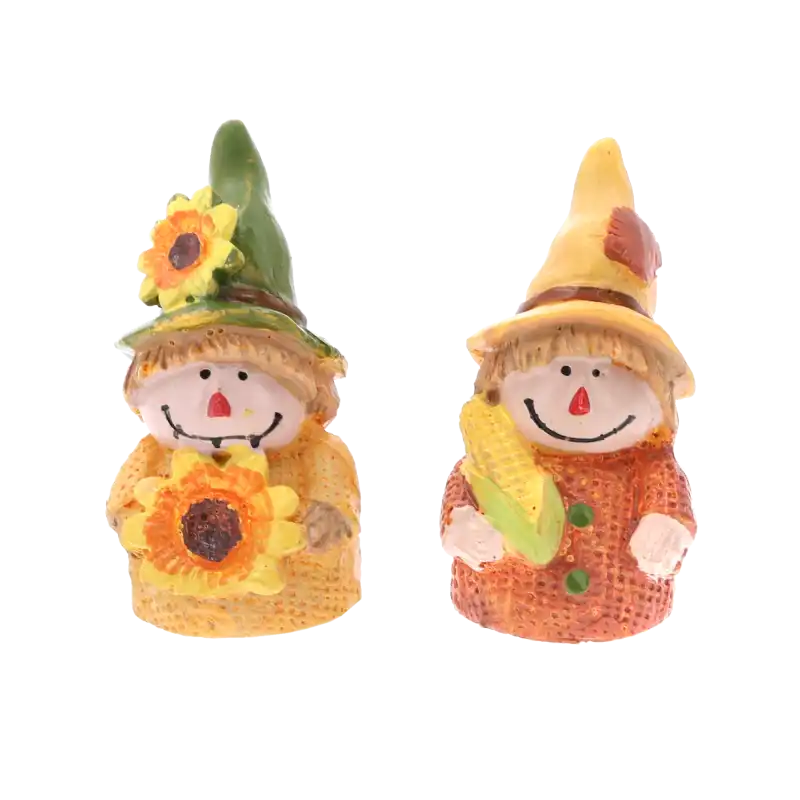 Zestaw dwóch samoprzylepnych figurek strachów na wróble o wysokości 6 cm. Ozdoby jesienne z polyresinu z motywem słonecznika i kukurydzy.