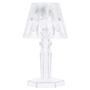 Wyłączona lampka LED prezentująca transparentny design i geometryczne kształty podstawy oraz klosza z tworzywa.