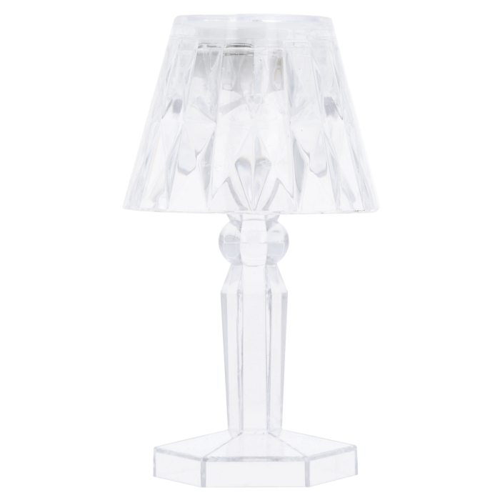 Wyłączona lampka LED prezentująca transparentny design i geometryczne kształty podstawy oraz klosza z tworzywa.
