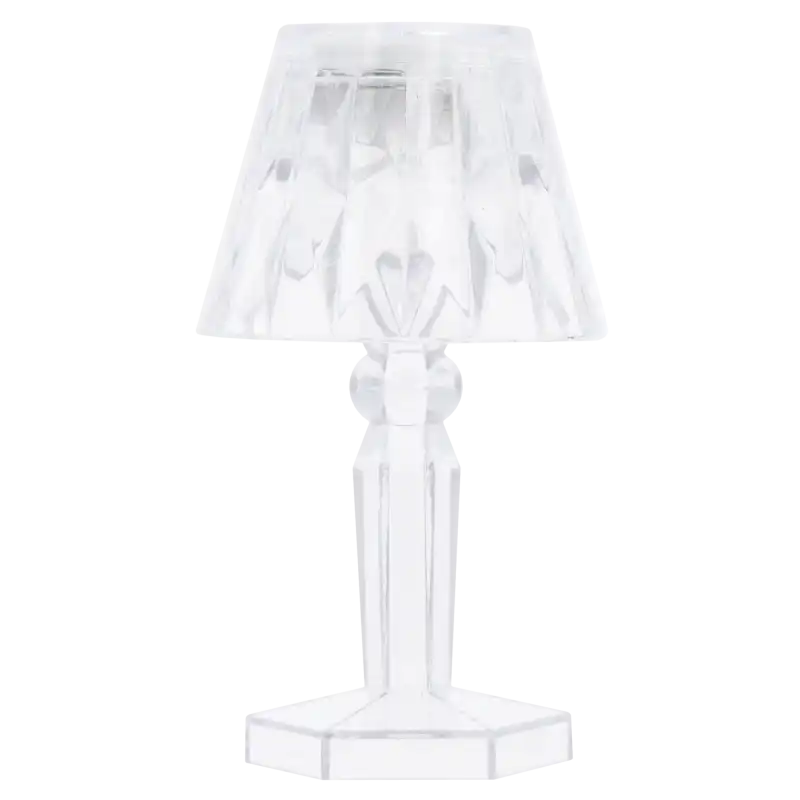 Wyłączona lampka LED prezentująca transparentny design i geometryczne kształty podstawy oraz klosza z tworzywa.