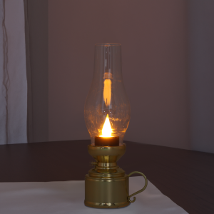 Złota lampa naftowa LED 19 cm ustawiona na blacie. Efekt migającego światła doskonale naśladuje blask palącej się świecy, idealnie pasując do świątecznej aranżacji.