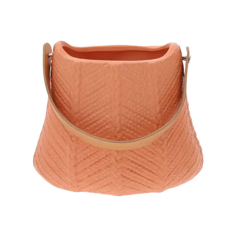 Pomarańczowa gipsowa torebka na kwiaty o wysokości 16 cm. Ceramiczne naczynie z ozdobnym tłoczeniem i skórzanym uchwytem to idealna dekoracja do wnętrz.