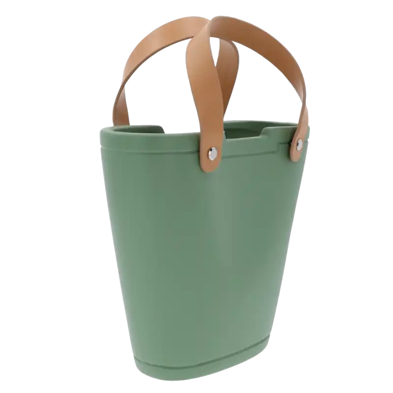 Zielona gipsowa torebka na kwiaty ze skórzanymi uchwytami. Ceramiczna osłonka o nowoczesnym kształcie, idealna jako element dekoracji wnętrz na każdą okazję.
