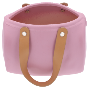 Ceramiczna osłonka na kwiaty w formie torebki z jasnymi uchwytami. Ujęcie z ukosa pokazujące wnętrze naczynia.