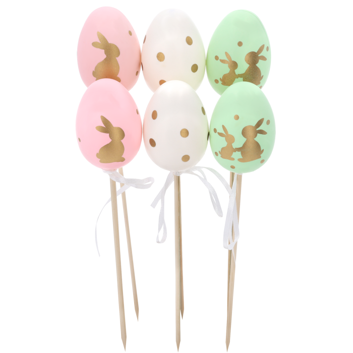 Komplet 6 pisanek na piku o wysokości 6 cm. Jajka w kropeczki oraz z nadrukiem zajączków, ozdobione wstążką.