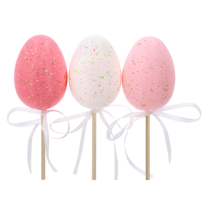 Trzy pisanki na piku o wysokości 6 cm w różowo-białych kolorach, ozdobione białą kokardką, idealne pisanki i jaja do wiosennych stroików.