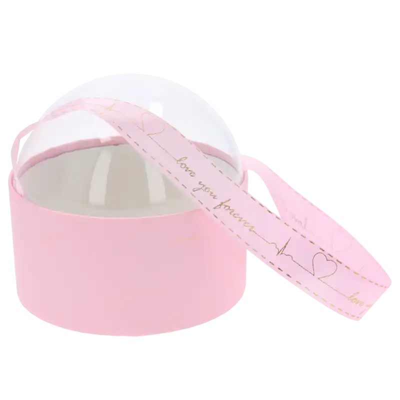 Transparentny flower box w kształcie różowej kuli o średnicy 13 cm z satynową wstążką. Eleganckie opakowanie na kwiaty i prezenty.