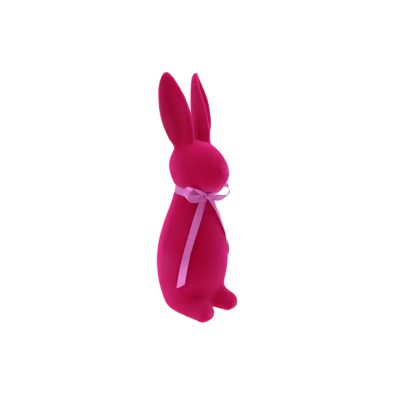 Zając flokowany w kolorze fuksji, ujęty w profilu. Dekoracja wielkanocna o wysokości 30 cm z satynową wstążką.