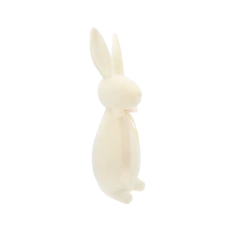 Kremowy zając wielkanocny flokowany o wysokości 47 cm. Ujęcie prezentujące sylwetkę z boku i profil głowy.