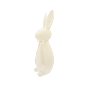 Flokowana figurka zająca w kremowym odcieniu z elegancką kokardą, pokazana z prawego półprofilu.