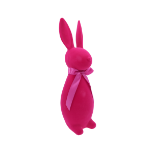 Nowoczesny zajączek wielkanocny w kolorze fuksji, ujęty w lekkim skręcie. Flokowana powierzchnia i satynowa kokarda nadają dekoracji elegancki wiosenny charakter.