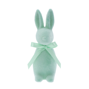 Turkusowy flokowany zając o wysokości 15 cm. Figurka posiada nowoczesną formę oraz elegancką kokardę na szyi, stanowiąc modną ozdobę wielkanocną do domu.