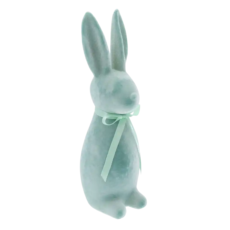 Figurka turkusowego zająca w ujęciu z profilu. Widoczna aksamitna faktura materiału oraz elegancka satynowa kokarda na szyi.