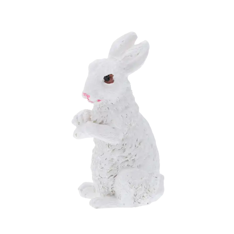 Biały zajączek wielkanocny o wysokości 7 cm w pozycji stojącej, prezentujący detale figurki wykonanej z tworzywa.