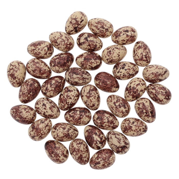 Zbiór 36 brązowych jajeczek wielkanocnych z nakrapianym wzorem. Pisanki o wymiarach 2,5x1,5 cm, wykonane z tworzywa, ułożone na płaskim tle.