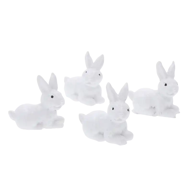 Zestaw 4 białych zajączków wielkanocnych o wysokości 3,5 cm. Miniaturowe figurki idealne do wiosennych stroików.