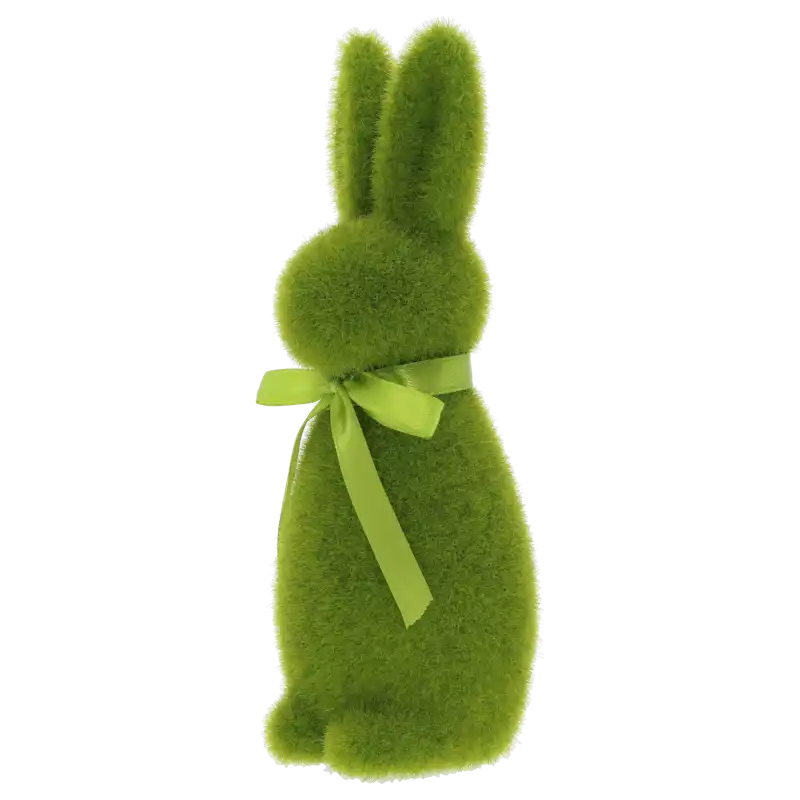 Zielony zając flokowany o wysokości 20 cm, uchwycony z boku. Elegancki element dekoracji świątecznej, który łatwo wkomponuje się w każdą wielkanocną kompozycję.
