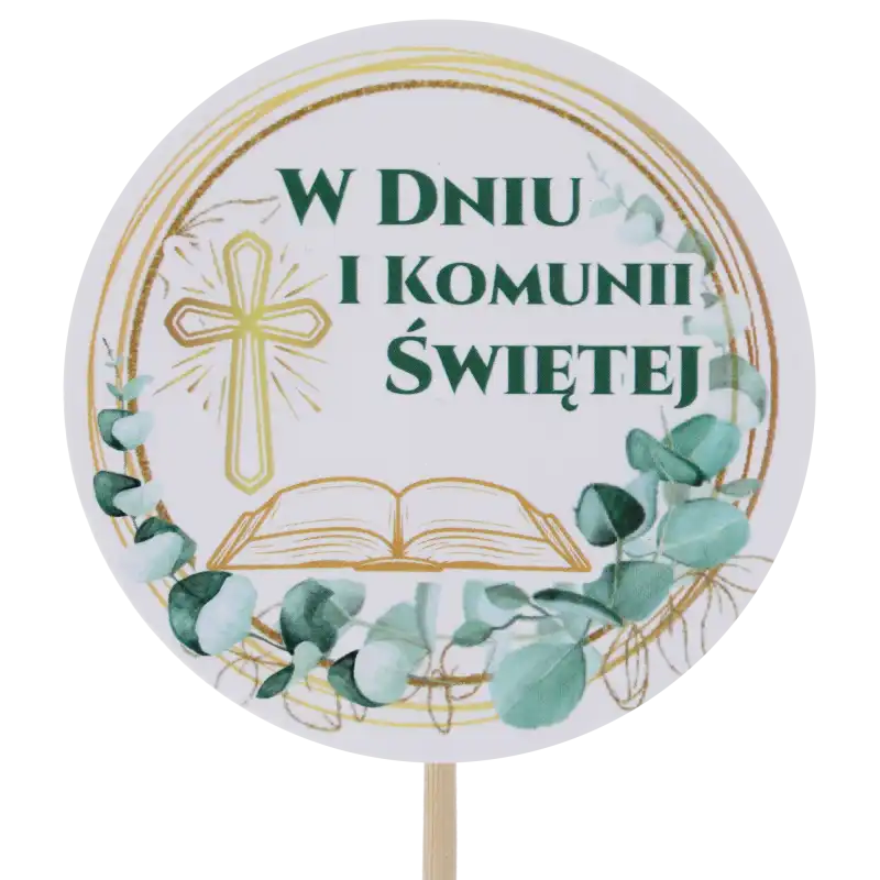 Zbliżenie na okrągły topper komunijny z motywem Pisma Świętego, krzyża i eukaliptusa. Dekoracja na piku o długości 29 cm ze wzmacnianego papieru z powłoką ochronną.