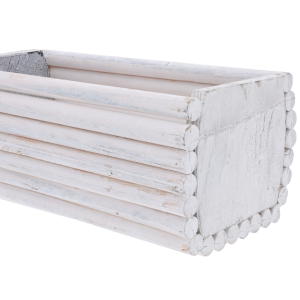 Kątowe ujęcie białej osłonki 30x15 cm wykonanej z drewnianych palików. Naturalny dodatek do wystroju wnętrz.