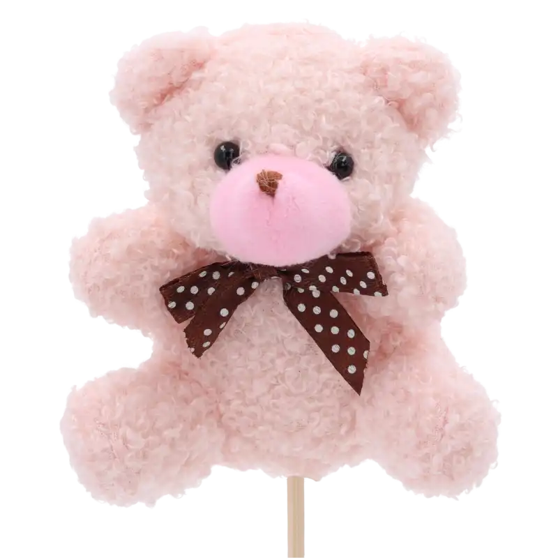 Jasnoróżowy miś na piku o wysokości 35 cm z kokardą w kropki. Idealny jako topper do kwiatów i prezentów.