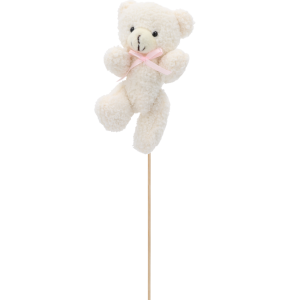Pluszowy miś w pozycji lekko pochylonej, zamocowany na stabilnym piku florystycznym.