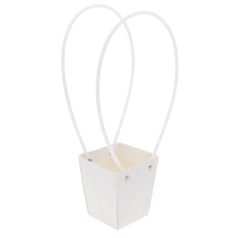 Pusta pikowana torebka kwiatowa w kolorze białym. Ujęcie z góry ukazuje wnętrze trapezowego pojemnika o wymiarach podstawy 7x7 cm z uchwytami.